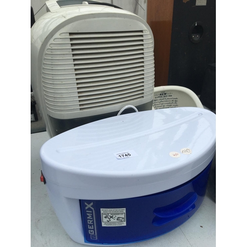 1745 - A DELONGHI DEHUMIDIFIER, A GERMEX BRUSH AND COMB SANITISER ETC BELIEVED TO BE IN WORKING ORDER BUT N... 