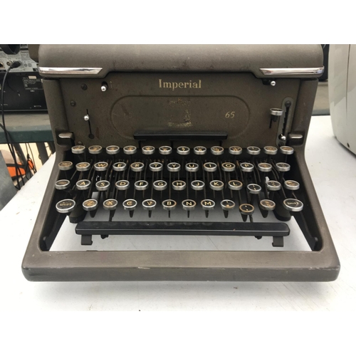 1746 - AN VINTAGE IMPERIAL TYPEWRITER