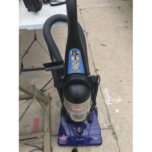 1750 - A BISSELL POWERFORCE HOOVER AND TWO GARDEN HAND SPRAYERS