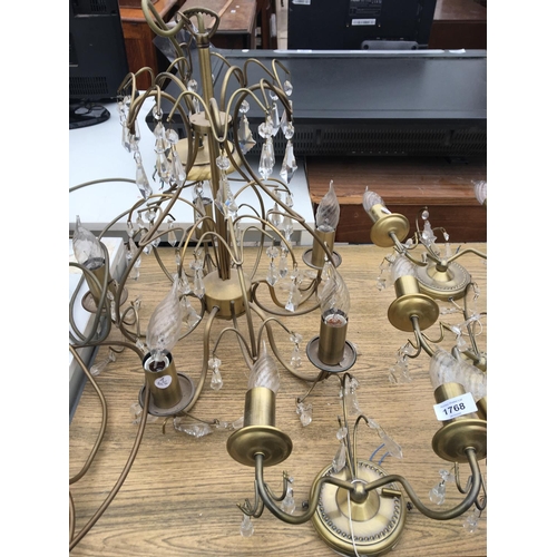 1768 - AN ASSORTMENT OF BRASS EFFECT LIGHTS TO INCLUDE WALL LIGHTS AND A CHANDELIER STYLE CEILING LIGHT