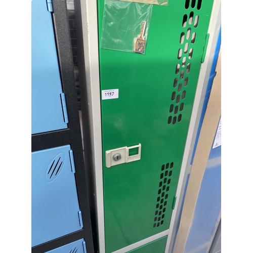 1587 - AN AS NEW GREEN DOUBLE LOCKER WITH KEYS