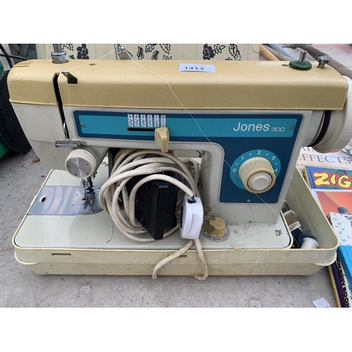 A VINTAGE CASED JONES 300 SEWING MACHINE