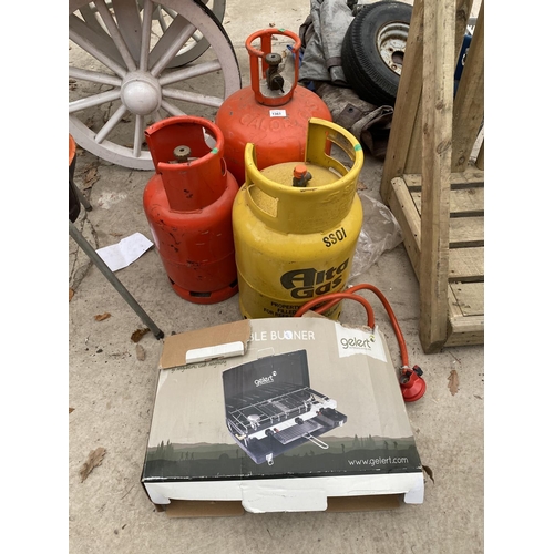 1363 - A GELERT DOUBLE BURNER CAMPING STOVE WITH GRILL AND THREE GAS BOTTLES (NO GRILL PAN)
