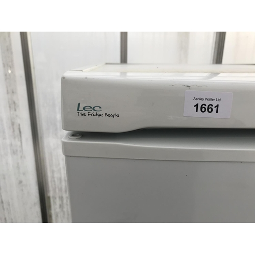 1661 - A WHITE LEC UPRIGHT FRIDGE FREEZER BELIEVED IN WORKING ORDER BUT NO WARRANTY