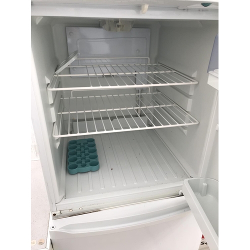 1661 - A WHITE LEC UPRIGHT FRIDGE FREEZER BELIEVED IN WORKING ORDER BUT NO WARRANTY