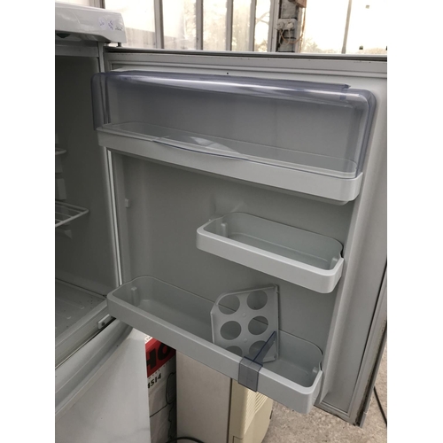 1661 - A WHITE LEC UPRIGHT FRIDGE FREEZER BELIEVED IN WORKING ORDER BUT NO WARRANTY