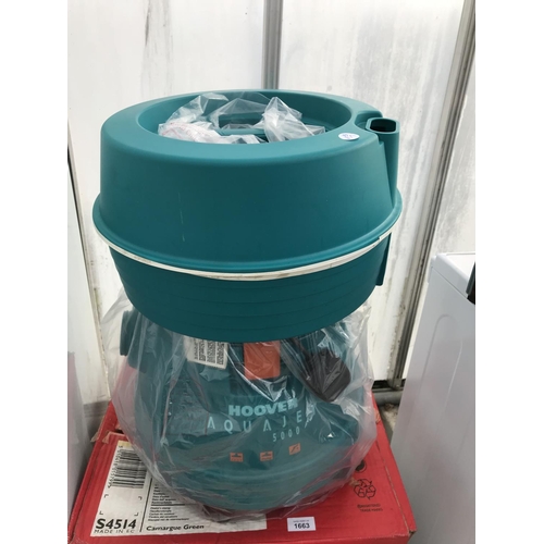 1663 - A HOOVER COMBINED WET AND DRY CARPET CLEANER BELIEVED IN WORKING ORDER BUT NO WARRANTY
