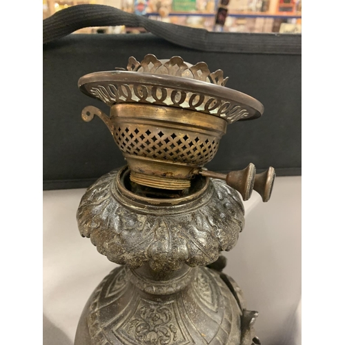 58 - A LARGE VINTAGE OIL LAMP WITH EAGLE DECORATION ( NEEDS A FITTING, SEE PHOTOGRAPH)