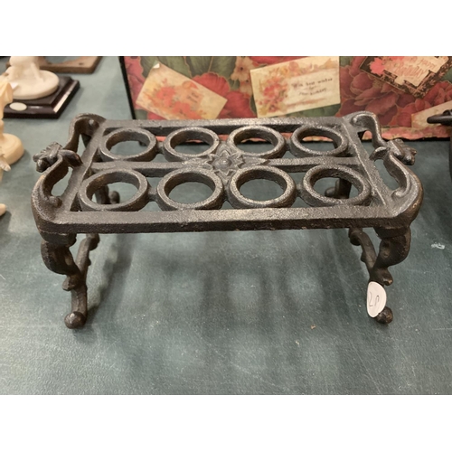 118 - A CAST IRON TRIVET