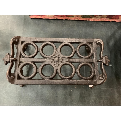 118 - A CAST IRON TRIVET