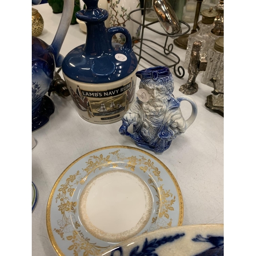 157 - A COLLECTION OF BLUE AND WHITE CERAMIC WARE TO INCLUDE A LARGE JUG, A SERVING PLATTER AND A 'LAMBS N... 