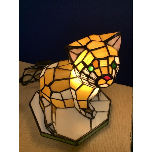 65 - A COLOURED GLASS CAT LAMP IN AN ART DECO STYLE