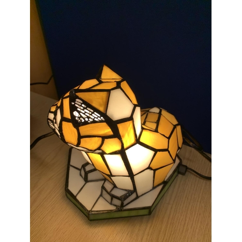 65 - A COLOURED GLASS CAT LAMP IN AN ART DECO STYLE