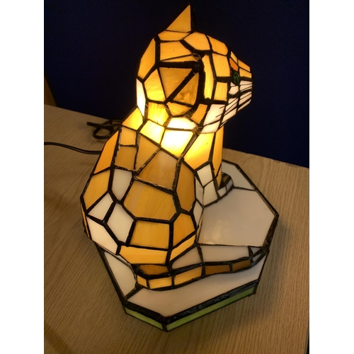 65 - A COLOURED GLASS CAT LAMP IN AN ART DECO STYLE