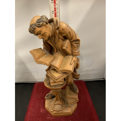 66 - A CARVED WOODEN FIGURINE OF AN HISTORICAL SCHOLAR