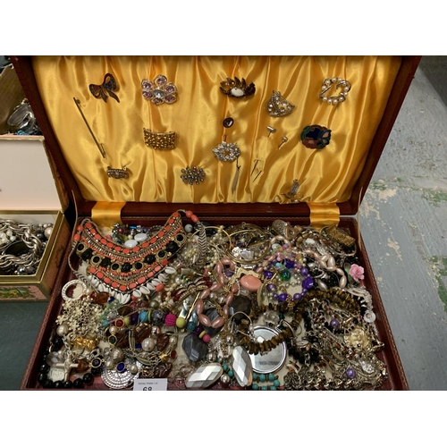 68 - A LARGE ASSORTMENT OF COSTUME JEWELLERY TO INCLUDE TO CASES