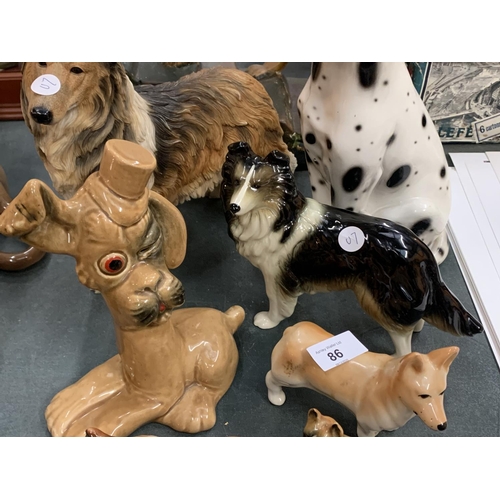 86 - AN ASSORTMENT OF EIGHT CERAMIC DOG FIGURES