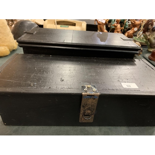 92 - A PAIR OF BLACK WOODEN DEED BOXES