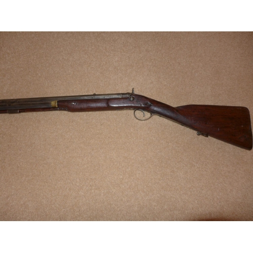 306 - A 10 BORE PERCUSSION CAP RIFLE, THE 74CM OCTAGONAL BARREL STAMPED BROWN & RODDA, TITCHBNEST STREET, ... 