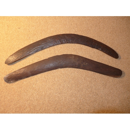 317 - TWO VINTAGE AUSTRALIAN ABORIGINE HAND CARVED BOOMERANGS, LENGTH 53CM AND 54CM (2)