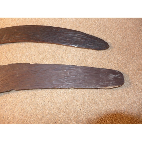 317 - TWO VINTAGE AUSTRALIAN ABORIGINE HAND CARVED BOOMERANGS, LENGTH 53CM AND 54CM (2)