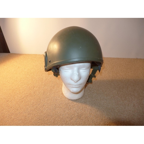 334 - A BRITISH ARMY TANK CREW HELMET DATED 1986