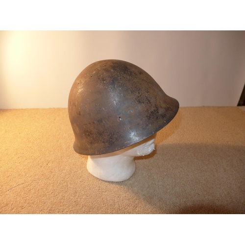 337 - A WORLD WAR II PERIOD JAPANESE STEEL HELMET