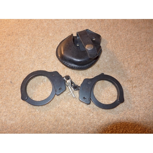 356 - A PAIR OF SMITH AND WESSON HANDCUFFS