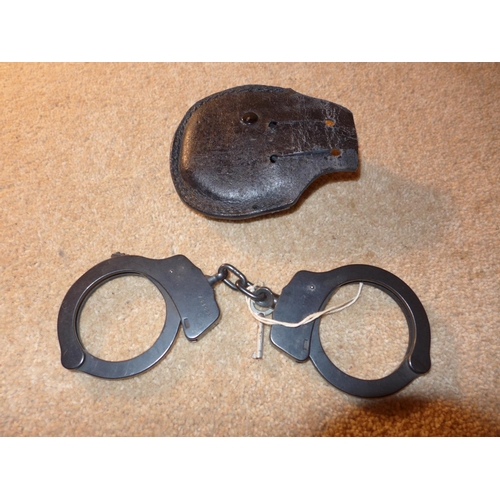 356 - A PAIR OF SMITH AND WESSON HANDCUFFS