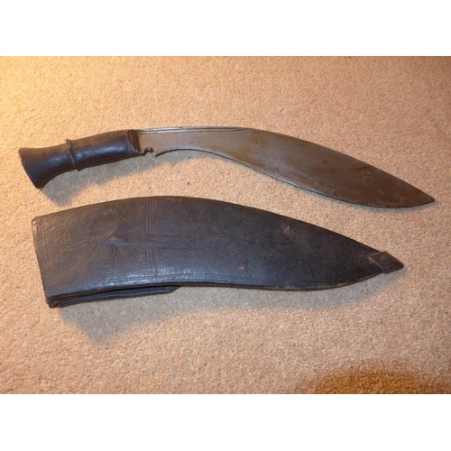 362 - A KUKRI KNIFE, 32CM BLADE, WITH LEATHER SCABBARD