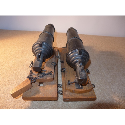 378 - A PAIR OF MODEL CARRONADES, 21CM LONG, CAST IRON BARRELS MOUNTED ON A SLIDING OAK FRAME, LENGTH 31CM... 