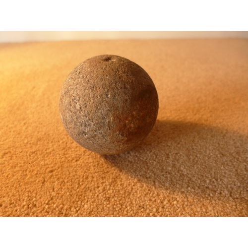 383 - A STONE BALL (POSSIBLY A CANNONBALL) 9CM DIAMETER