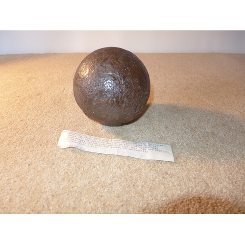 384 - A CAST IRON CANNONBALL RECOVERED FROM THE WRECK OF H.M.S. ASSOCIATION. THE SHIP SANK IN 1707 WITH AL... 