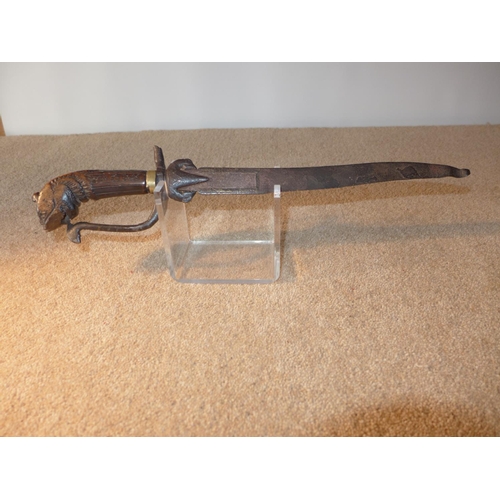 387 - A FAR EASTERN KNIFE, 29CM BLADE, WITH CARVED WOODEN GRIP IN THE FORM OF A TIGERS HEAD