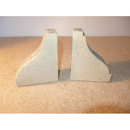 396 - A PAIR OF STONE BOOKENDS, EACH BOOKEND WITH LEAD PLAQUE STATING 