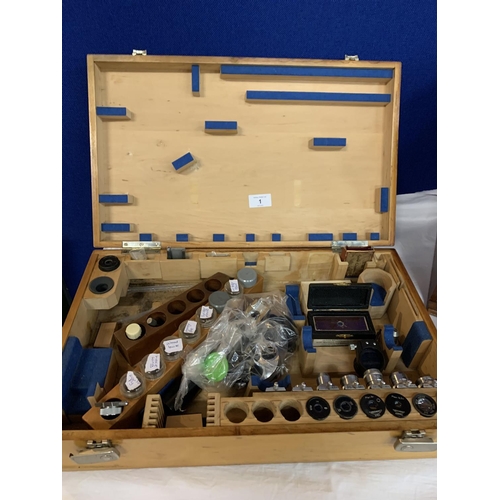 1 - A BOXED VINTAGE COOKE MICROSCOPE WITH INSTRUCTION MANUAL TO INCLUDE A FURTHER BOX CONTAINING SEVERAL... 