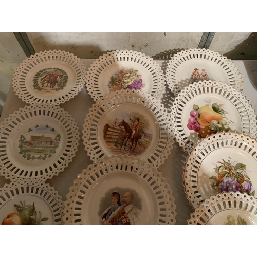 873 - A COLLECTION OF CERAMIC PLATES WITH DECORATIVE OUTER EDGING