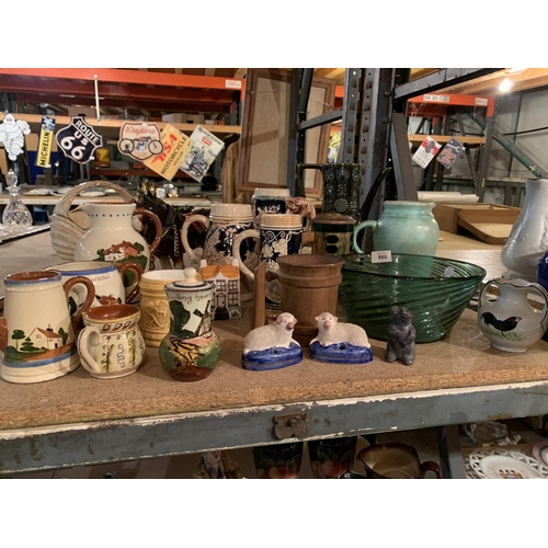 880 - AN ASSORTMENT OF VARIOUS CERAMIC AND GLASSWARE TO INCLUDE GERMAN STEINS ETC