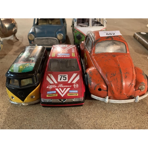 882 - FIVE VINTAGE MODEL VEHICLES TO INCLUDE TWO CAMPER VANS AND A MINI