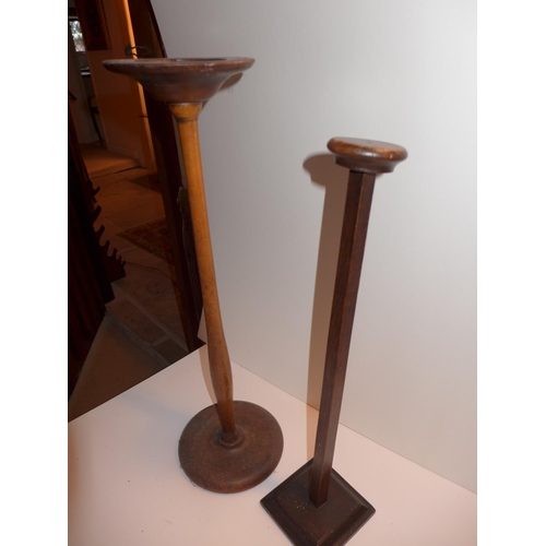 444 - TWO WOODEN STANDS SUITABLE FOR HATS/HELMETS, HEIGHT 60CM AND 66CM, TOGETHER WITH A METAL STAND