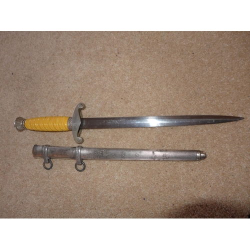 460 - A GERMAN ARMY DAGGER, THE 25CM BLADE MARKED A.W.B., GRIP ENGRAVED FRITZ MULLER, EAGLE AND SWASTIKA