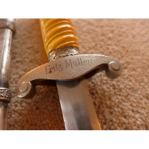 460 - A GERMAN ARMY DAGGER, THE 25CM BLADE MARKED A.W.B., GRIP ENGRAVED FRITZ MULLER, EAGLE AND SWASTIKA