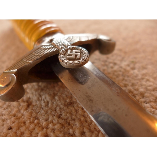 460 - A GERMAN ARMY DAGGER, THE 25CM BLADE MARKED A.W.B., GRIP ENGRAVED FRITZ MULLER, EAGLE AND SWASTIKA