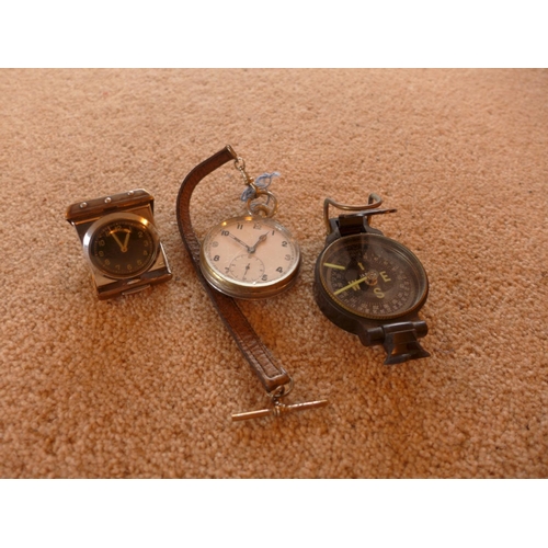 468 - A MILITARY G.S.T.P. WATCH, COMPASS AND A SMALL BEDSIDE CLOCK