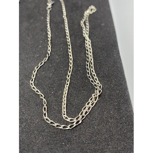 517 - THREE SILVER NECKLACES