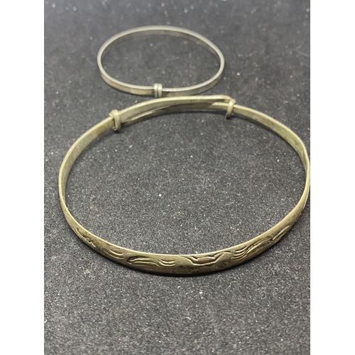 532 - SIX SILVER BANGLES