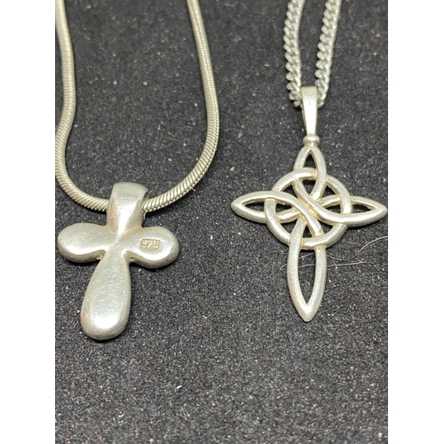 546 - SIX SILVER NECKLACES WITH VARIOUS PENDANTS TO INCLUDE CROSSES