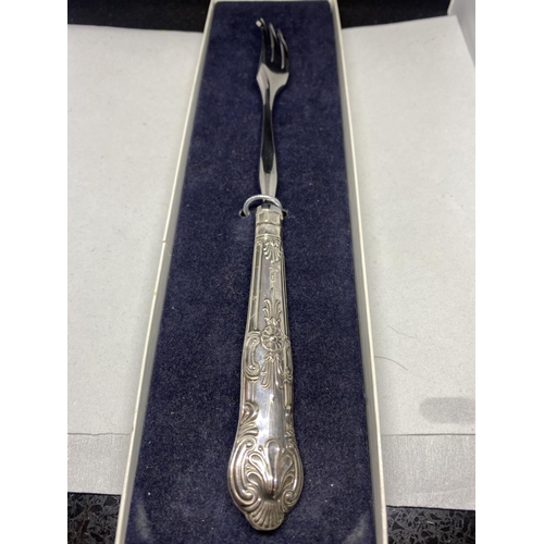 570 - A SILVER HANDLED PICKLE FORK HALLMARKED SHEFFIELD WITH PRESENTATION BOX