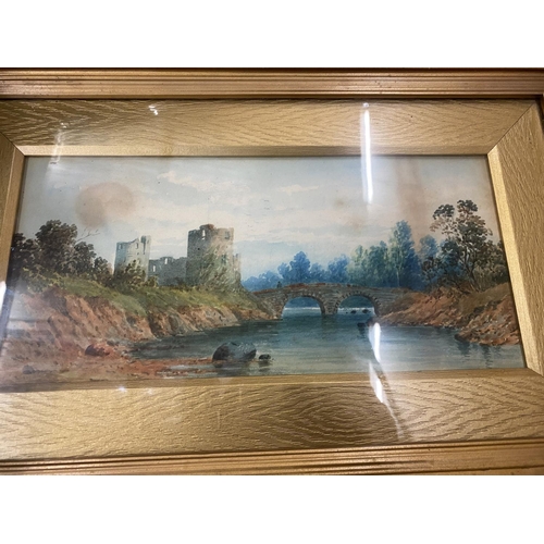 92 - A FRAMED WATERCOLOUR OF A CASTLE AND RIVER SCENE