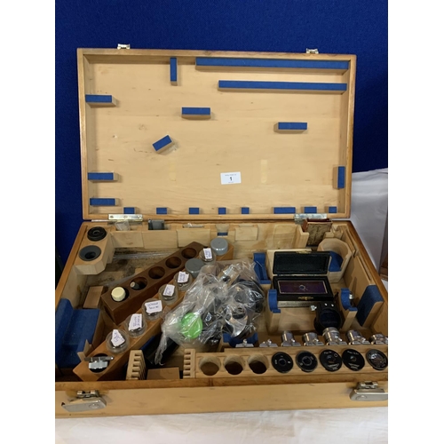 1 - A BOXED VINTAGE COOKE MICROSCOPE WITH INSTRUCTION MANUAL TO INCLUDE A FURTHER BOX CONTAINING SEVERAL... 